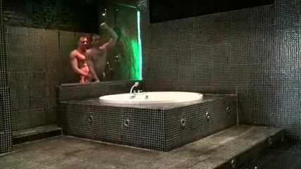 Sexy guys fuck in a shower