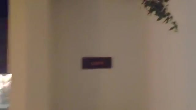 Squat pissing at public hotel pool shower room