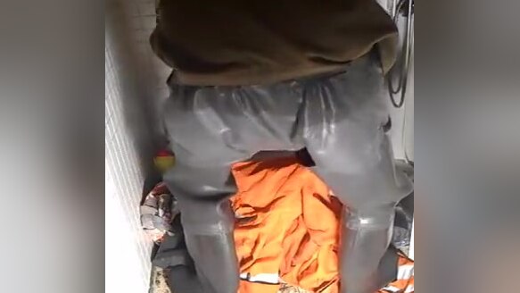 nlboots - rubber waders, rubber shorts and military shirt