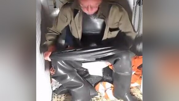 nlboots - rubber waders, rubber shorts and military shirt