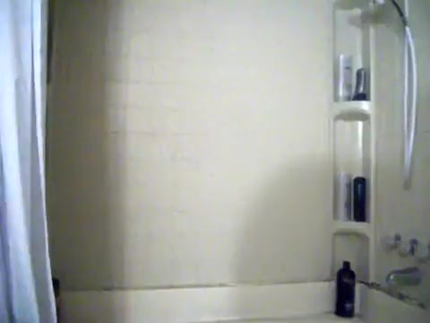 Showering in white boxer briefs