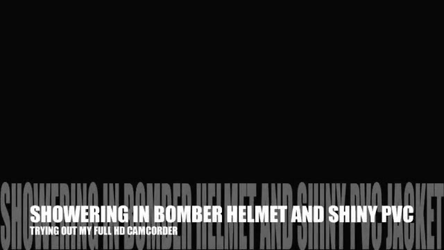 SHOWERING IN BOMBER HELMET AND PVC JACKET
