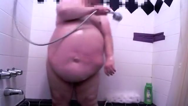 Fat guy taking a shower