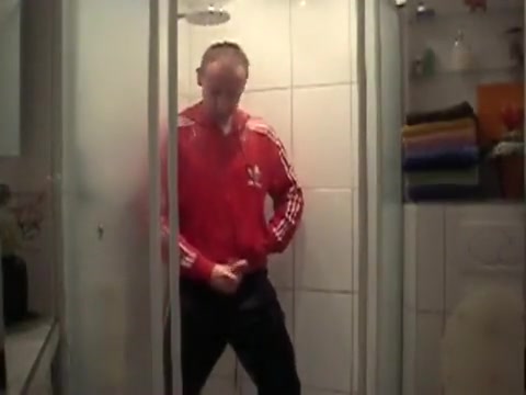 Fully dressed in adidas shower