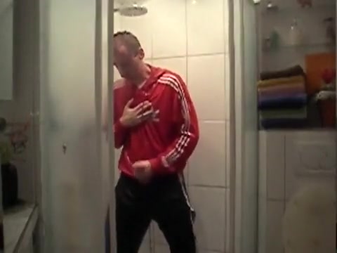 Fully dressed in adidas shower