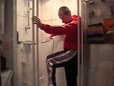 Fully dressed in adidas shower