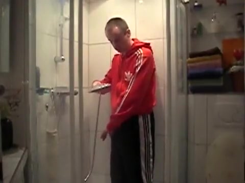 Fully dressed in adidas shower
