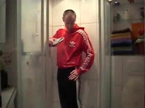 Fully dressed in adidas shower