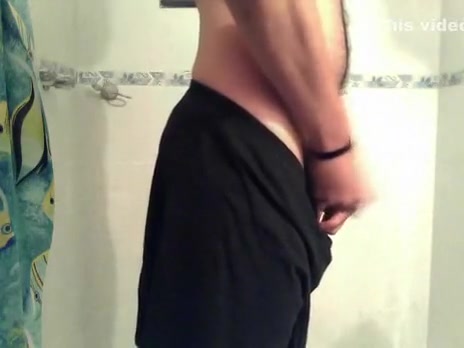 latin muscle taking a shower