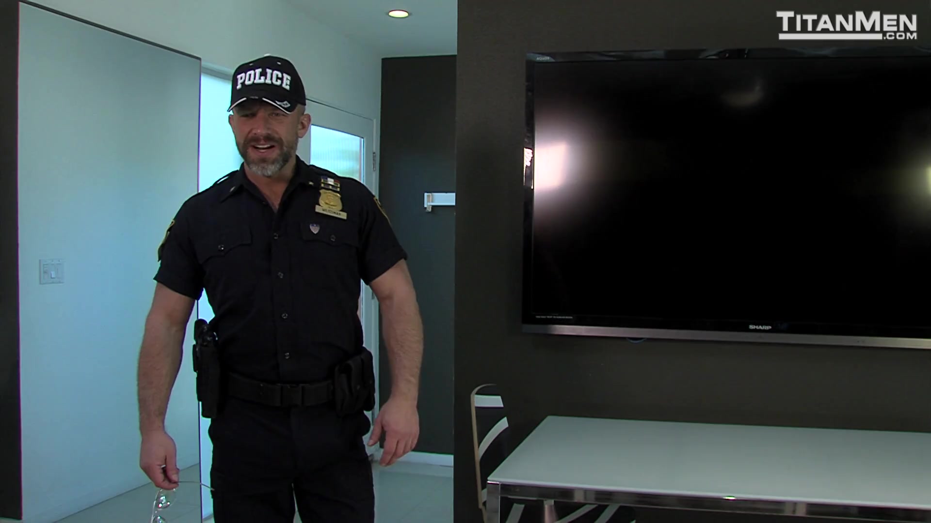 Package: Dirk Caber delivers his hard cop cock into Matthew Bosch's hairy hole