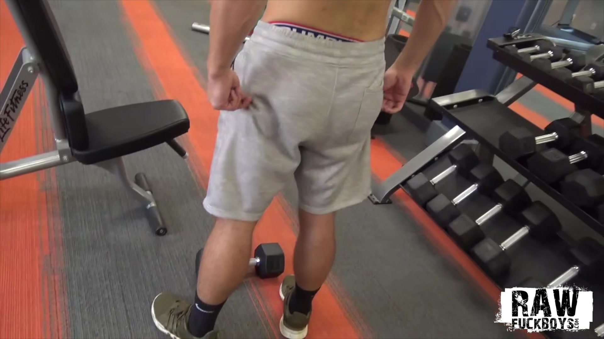 RawFuckBoys - Young hairy stud strokes big cock solo after hot workout