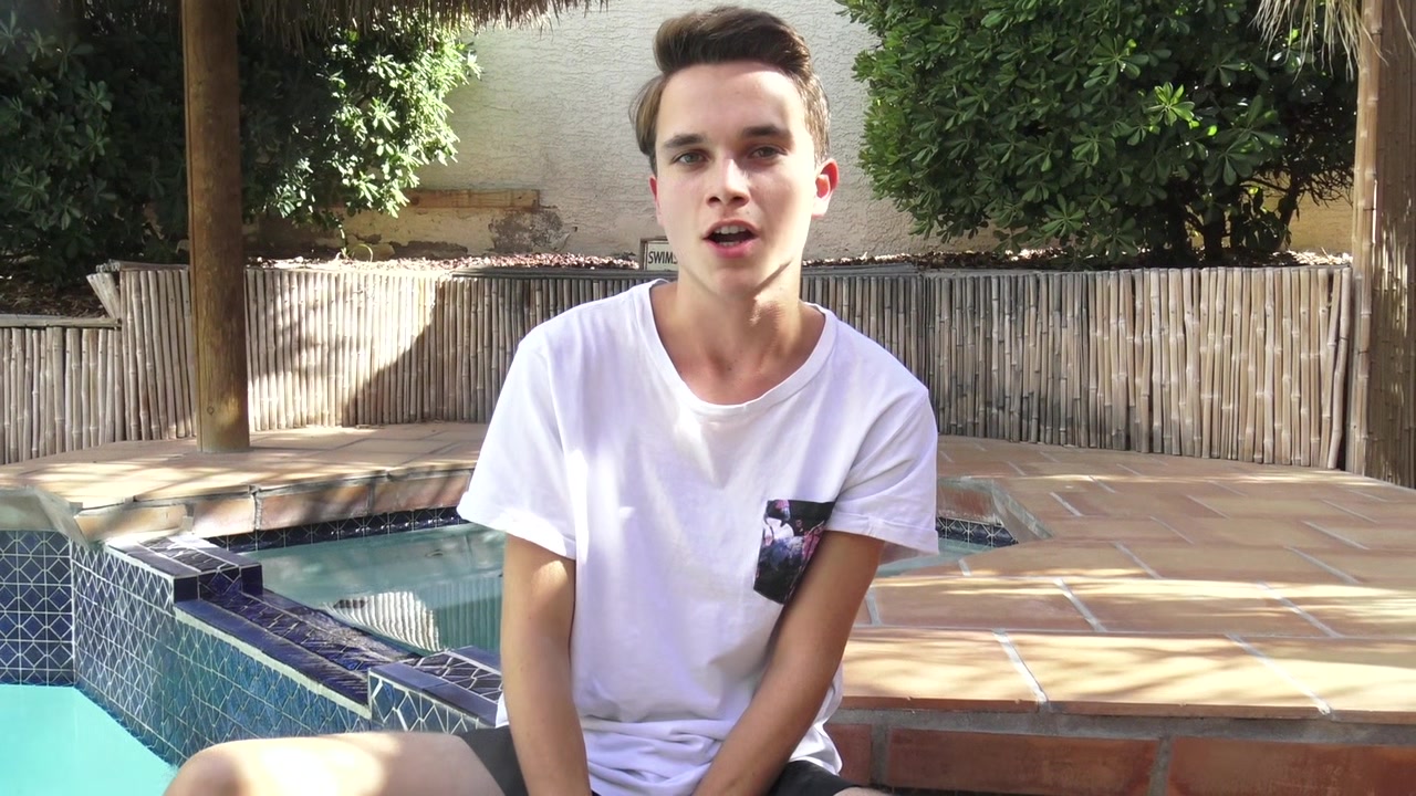 Cute twink Cody Wilson jerks off by the pool