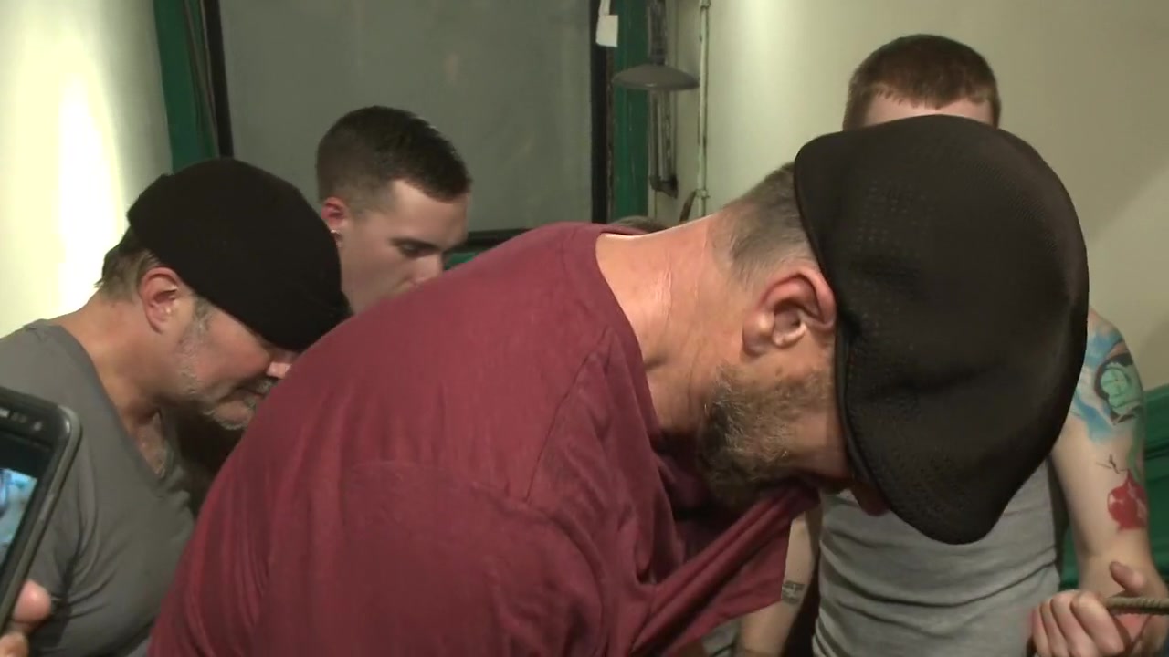 Muscled hunk tormented & gang banged in a stairwell full of horny men