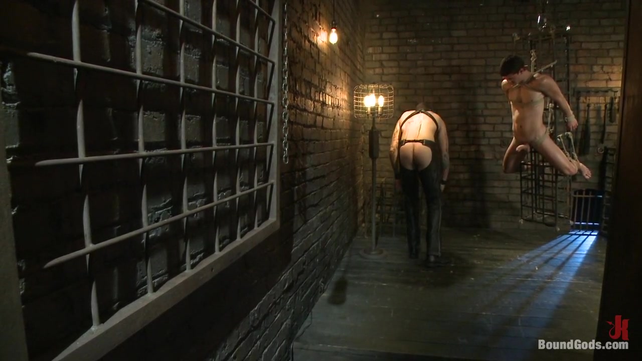 Caged sex slave endures a beating, hot wax and hard stockade fuck