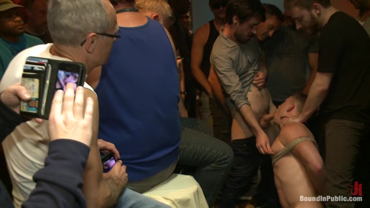 Ripped stud with a giant cock get used in a crowded bar