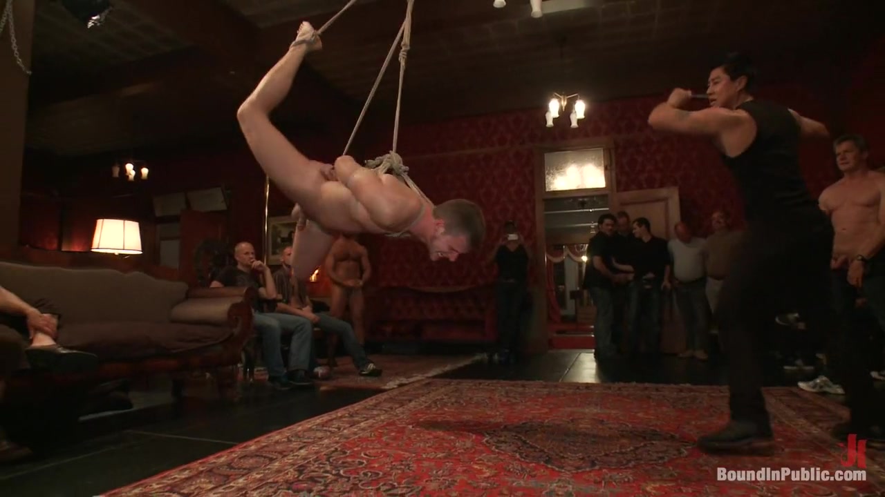 Sexy stud gets shocked, suspended, and gang fucked on the Upper Floor
