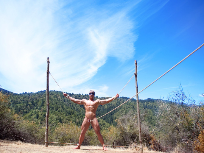 Captured straight jock gets his tight ass violated in the deep woods