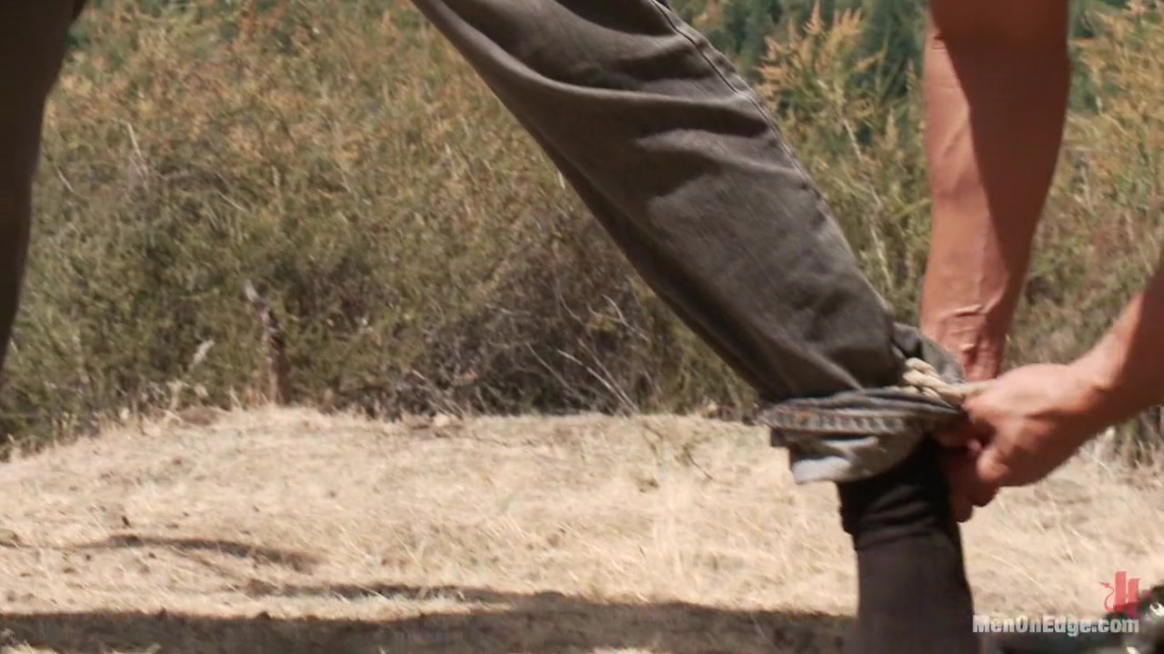 Captured straight jock gets his tight ass violated in the deep woods