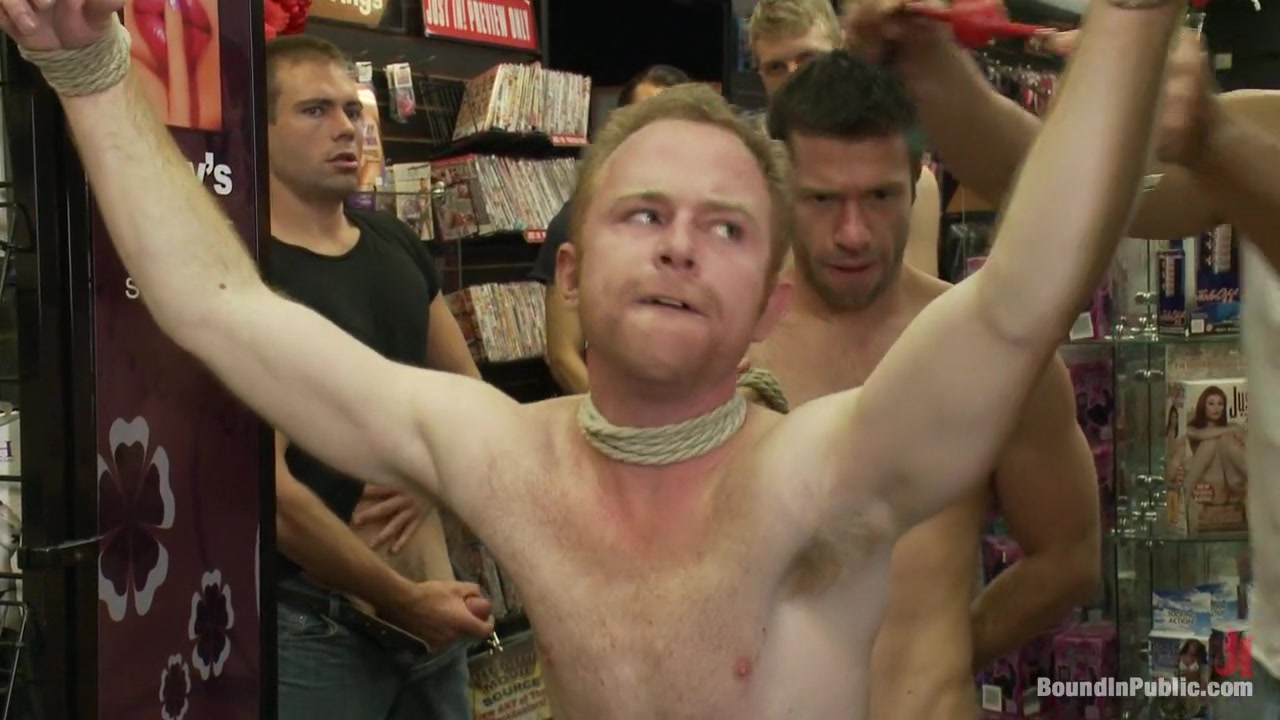Hot Gym Trainer Gets Tied up and Gang Fucked in a Porn Store