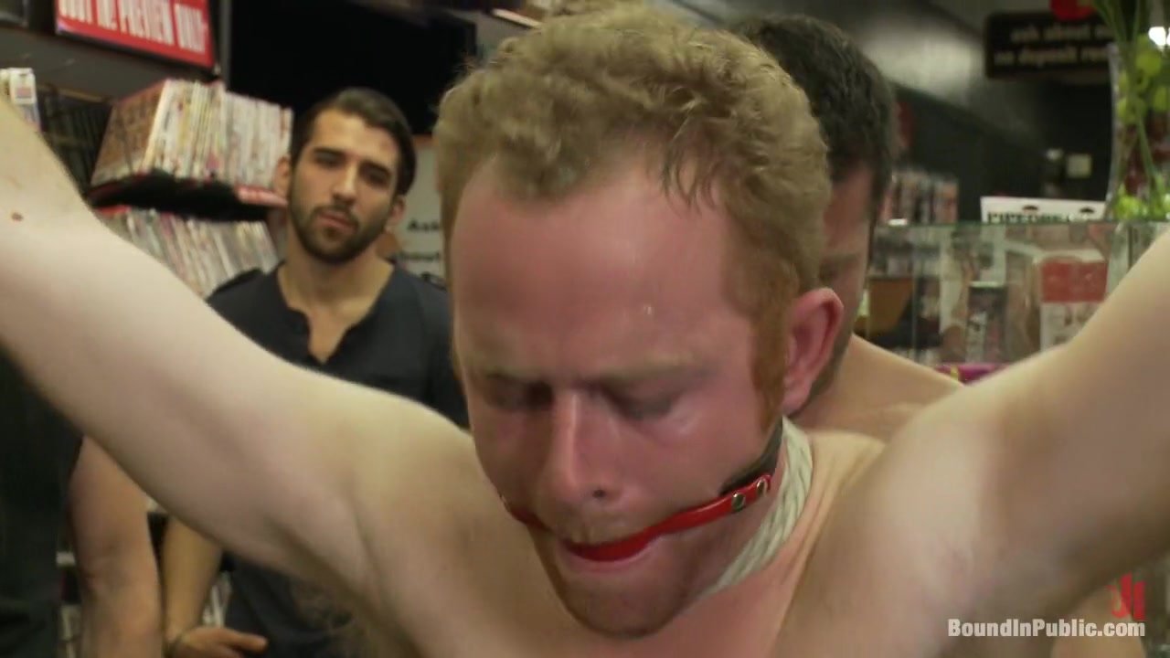 Hot Gym Trainer Gets Tied up and Gang Fucked in a Porn Store
