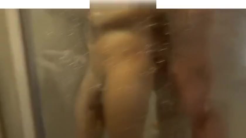Giant muscle man shower with tiny small guy