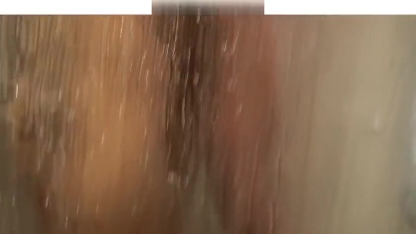 Giant muscle man shower with tiny small guy