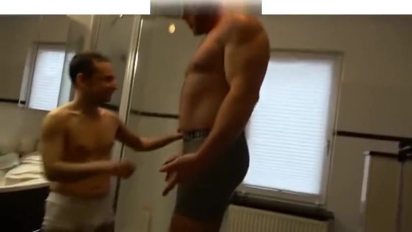 Giant muscle man shower with tiny small guy