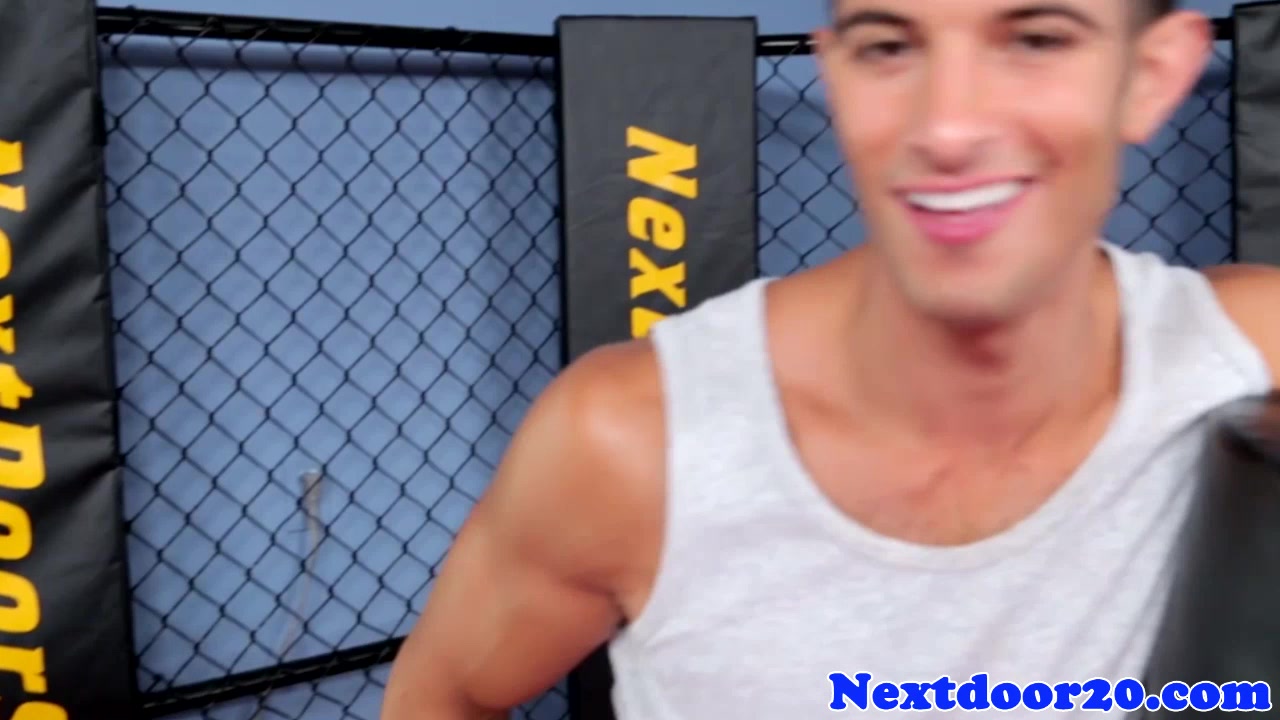 Athletic stud jerking off in a boxing ring