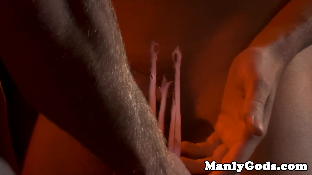 Muscular gay hunk duo jerking off together