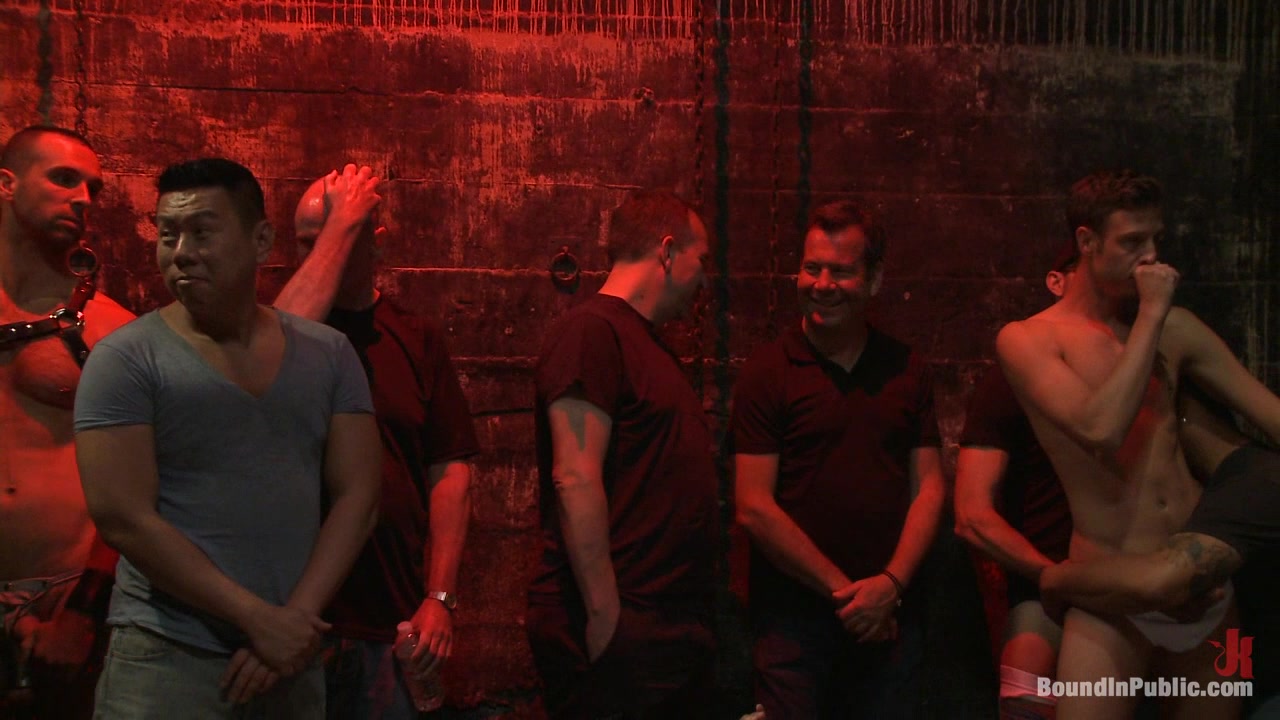 Bound in Public. Southern stud gets fucked and showered with cum in front of 100 men