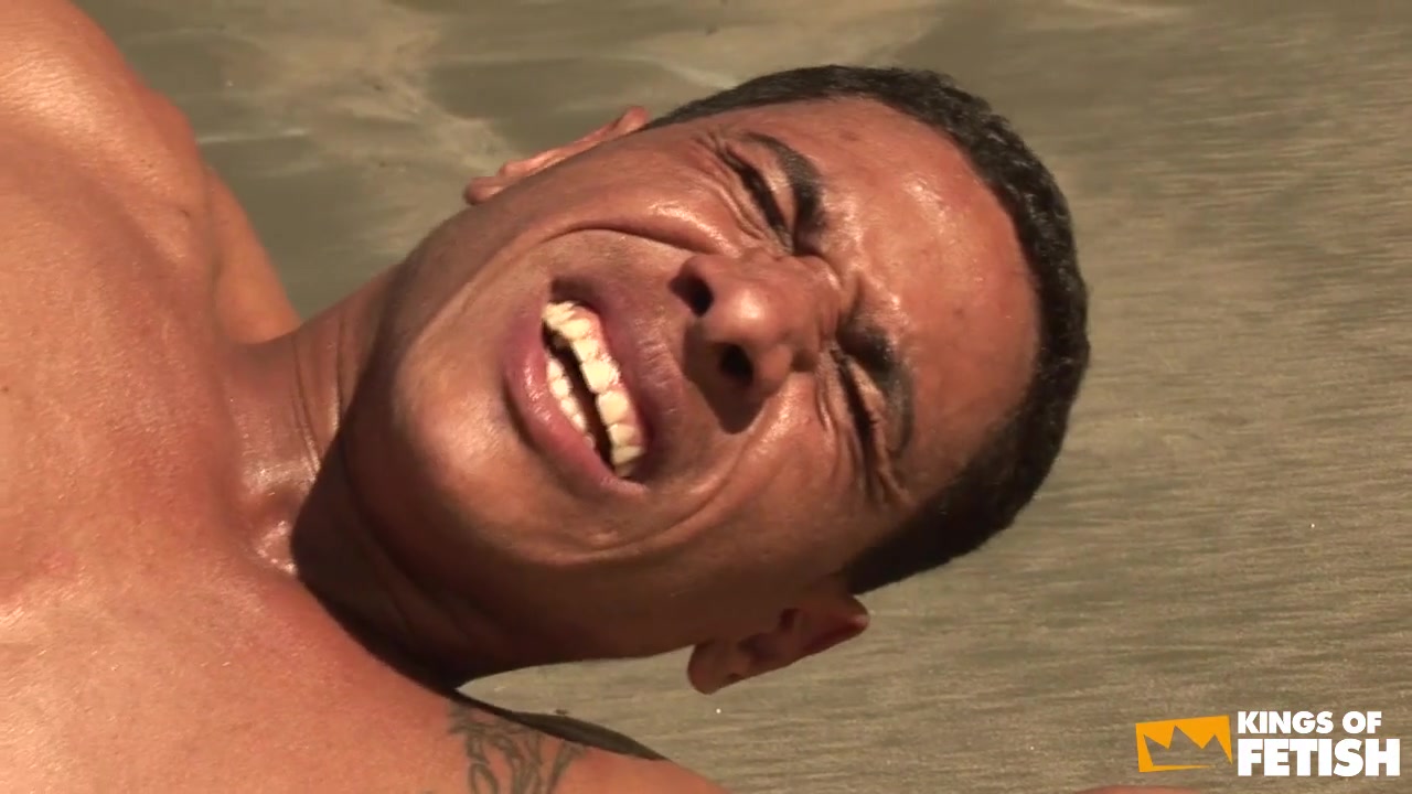 Muscular dude gets ass fisted and pounded by his friend on the beach