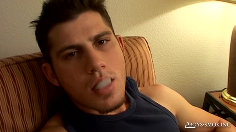 BoysSmoking: Smoker Levi Tugs His Long Thick Uncut Meat