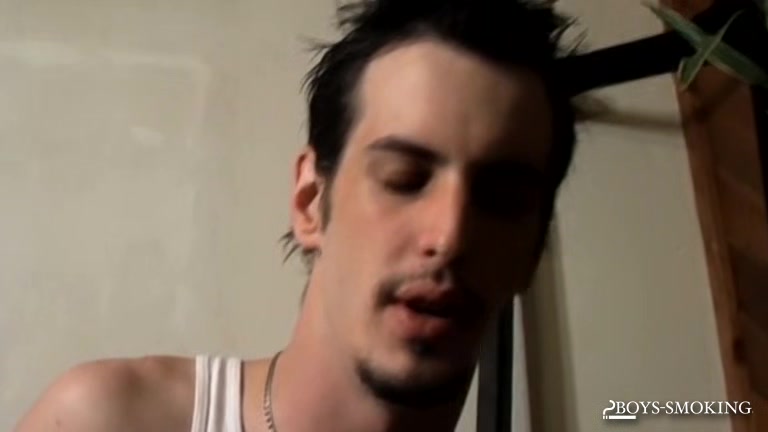 BoysSmoking: Axel Smokes Heavy While Rocking Out And Stroking His Dick