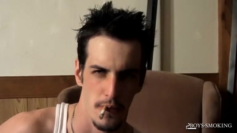 BoysSmoking: Axel Smokes Heavy While Rocking Out And Stroking His Dick