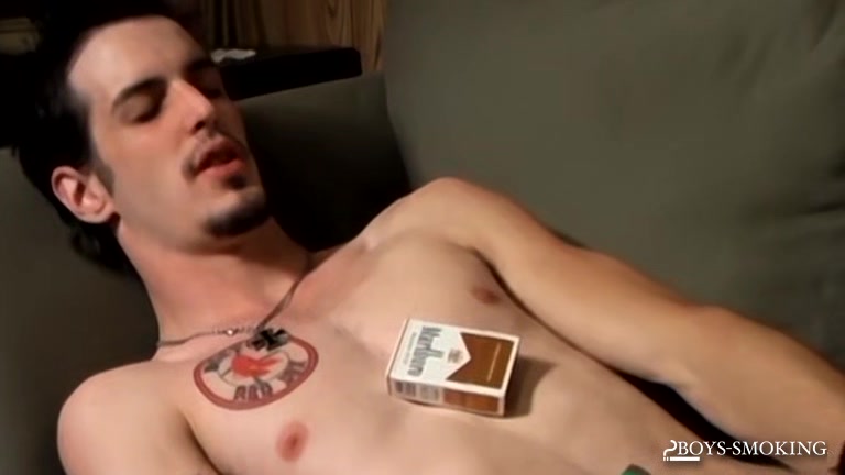 BoysSmoking: Axel Smokes Heavy While Rocking Out And Stroking His Dick