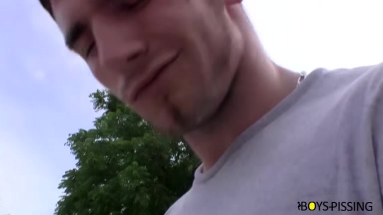 BoyPissing: Ripped Elijah Knight Pisses In The Sun And Strokes His Hard Cock Outside