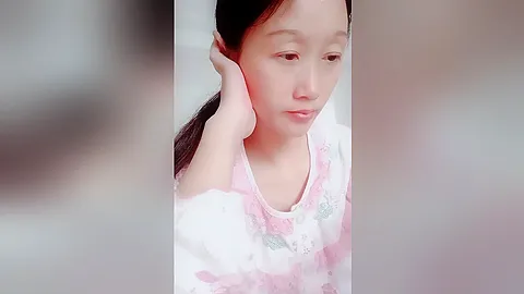 Video of an inexperienced Asian couple shagging in bed, taken from another site.