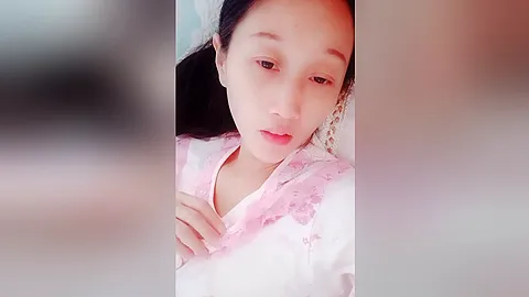 Video of an inexperienced Asian couple shagging in bed, taken from another site.