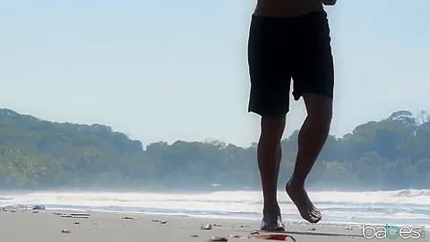 Running Man Finds Cute Redhead On The Beach