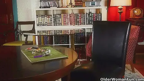 Hard nippled milf fingers her mature pussy