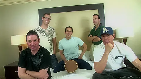 Horny amateur brunette takes on five men at once