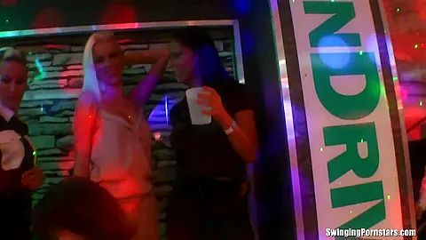 Sexy girls dancing erotically in a club