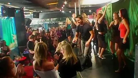 Excited party chicks suck cocks in club orgy