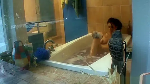 Cute brunette watches her stepsister take a bath