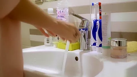 my stepsister caresses her ass in the shower