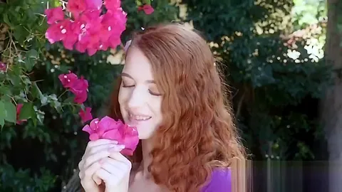 Hot redhead chick gets banged hard as she plays with plants in backyard