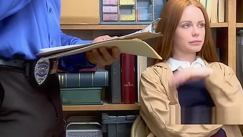 Hot redhead Ella complies with horny officerss order of stripping down