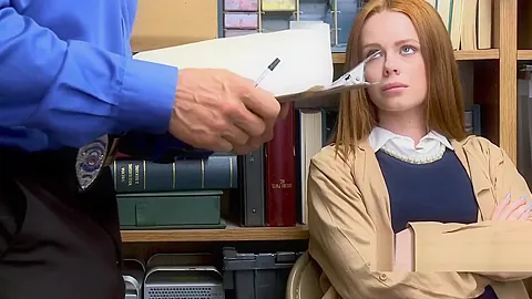 Hot redhead Ella complies with horny officerss order of stripping down