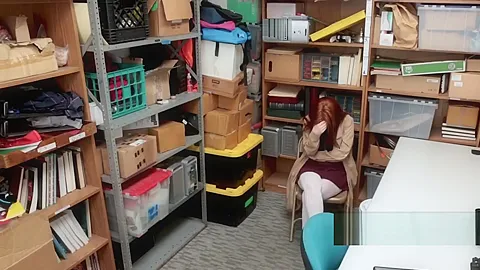 Hot redhead Ella complies with horny officerss order of stripping down