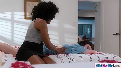 Ebony gives big tits wife a massage and is facesitted by her